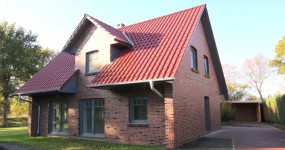 Neubau-Einfamilienhaus mit Carport in Westerstede-Ocholt, Wohngebietslage