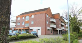 Kapitalanlage! Vermietete 3-Zimmer-Obergeschosswohnung mit Balkon und Tiefgaragen-Stellplatz im Zentrum von Bad Zwischenahn