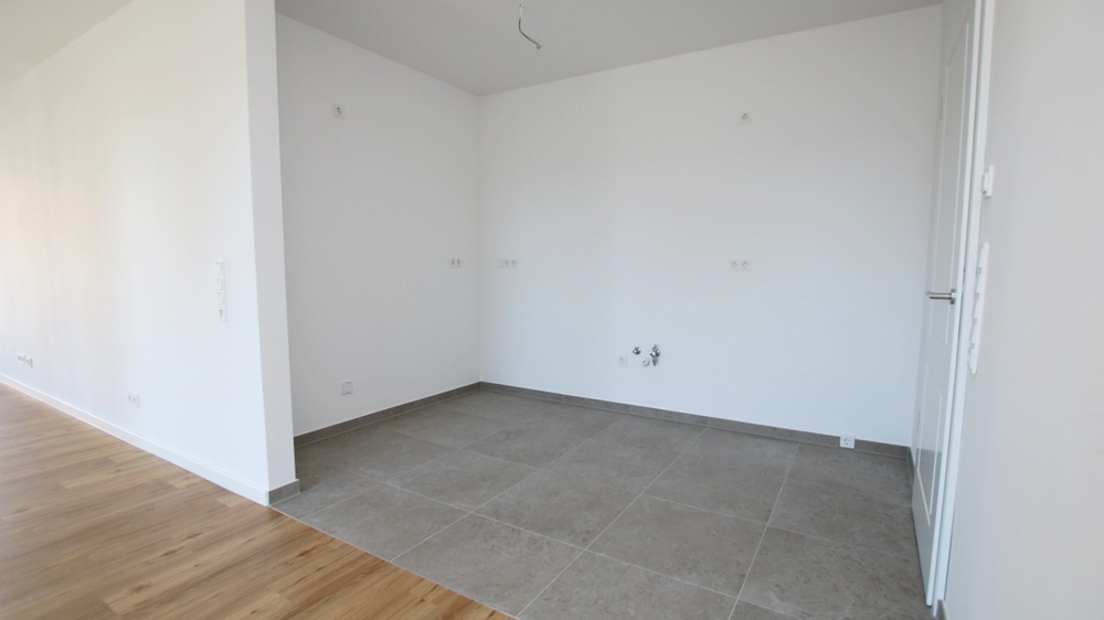 Neubau! Hochwertige 2-Zimmer-Wohnung mit Balkon im Zentrum von Bad Zwischenahn - Photo 5