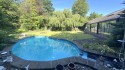 Rückansicht des Wohnhauses mit Impressionen des großzügigen Gartenbereichs