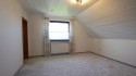 Schlafenzimmer mit angrenzendem Bad