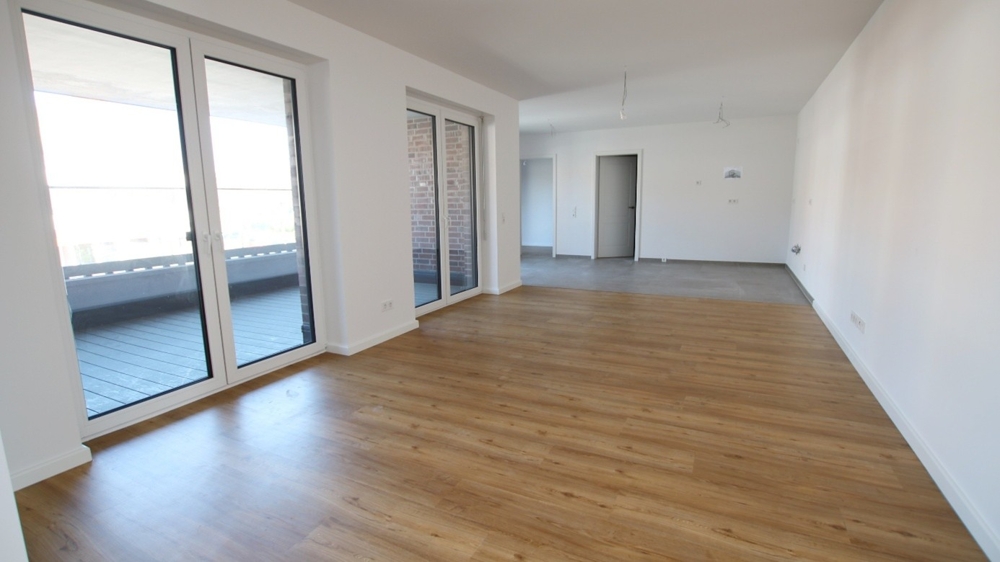 Neubau! Hochwertige 4-Zimmer-Wohnung mit Balkon im Zentrum von Bad Zwischenahn - Photo 2