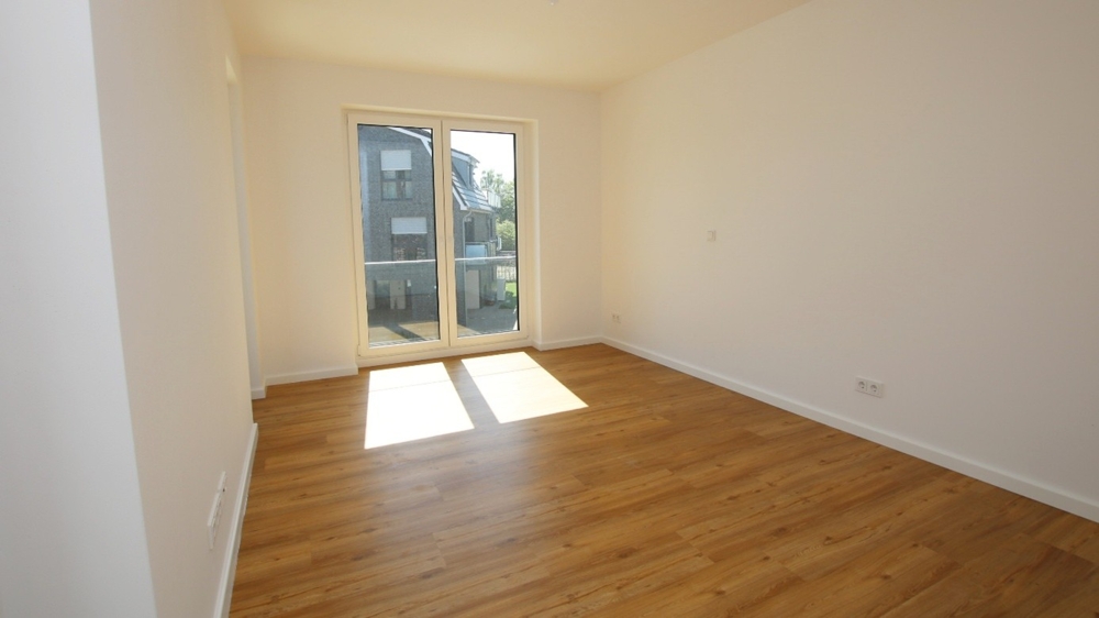 Neubau! Hochwertige 3-Zimmer-Wohnung mit Balkon im Zentrum von Bad Zwischenahn - Photo 1
