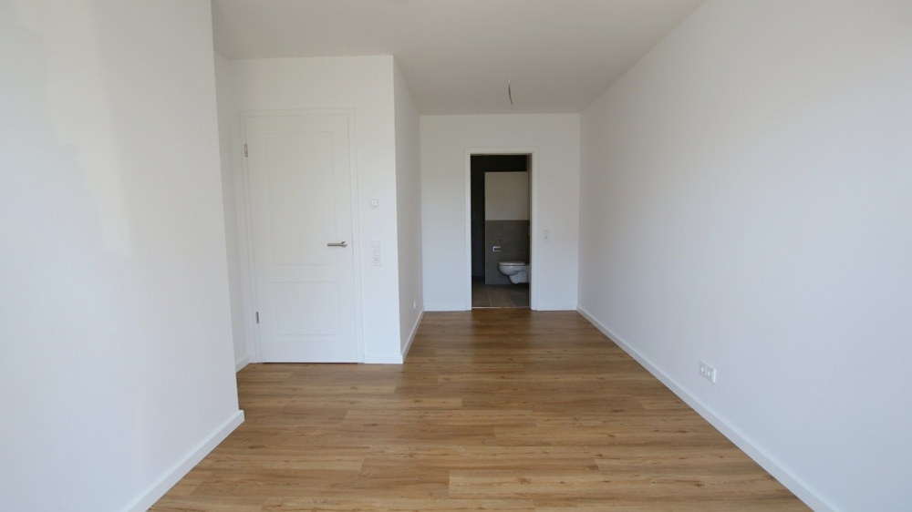 Neubau! Hochwertige 2-Zimmer-Wohnung mit Balkon im Zentrum von Bad Zwischenahn - Photo 3