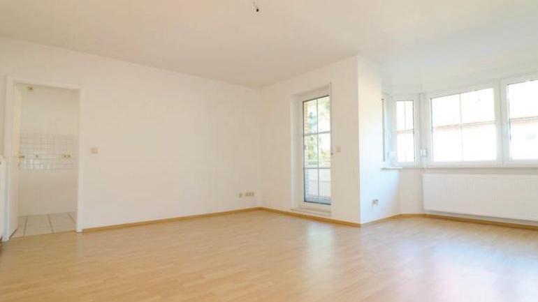 Komfort-Obergeschosswohnung mit West-Balkon und Carportstellplatz in Bad Zwischenahn - Foto 1