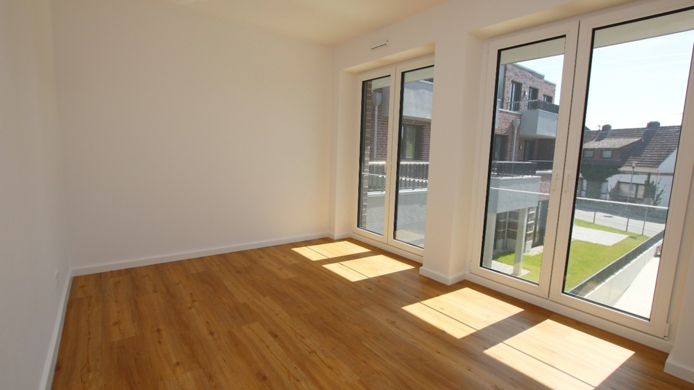 Neubau! Hochwertige 4-Zimmer-Wohnung mit Balkon im Zentrum von Bad Zwischenahn - Photo 1