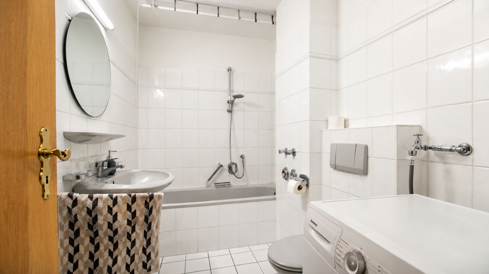 Dachgeschosswohnung mit Balkon und Pkw-Stellplatz in Westerstede - zentrale Wohnlage - Photo 4