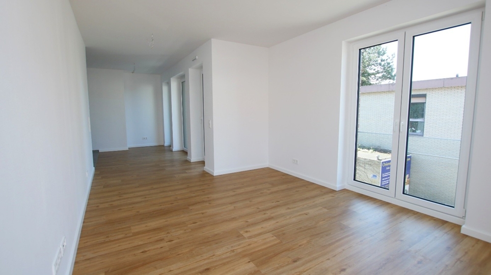 Neubau! Hochwertige 2-Zimmer-Wohnung mit Balkon im Zentrum von Bad Zwischenahn - Photo 2