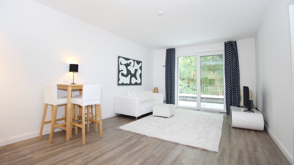 Exklusives Wohnen in einer 2-Zimmer-Penthouse-Wohnung mit Dachterrasse und Stellplatz inkl. EBK - Photo 1